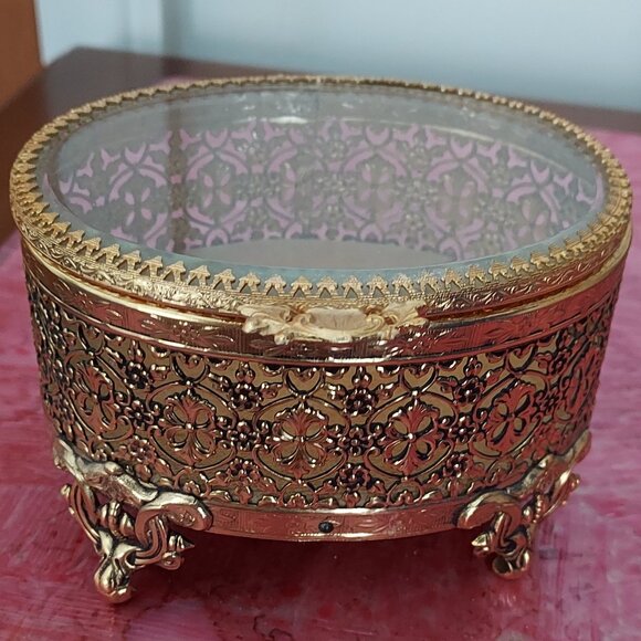 Vtg Oval Gold Tone Filigree Ormolu Footed Jewelry Box w/ Clear Glass Hinged Top - Picture 1 of 16